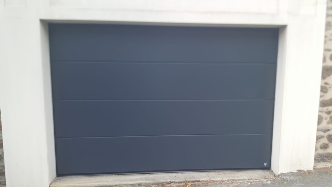 Modifier porte de garage sectionnelle