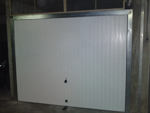 Réparer une porte de garage basculante