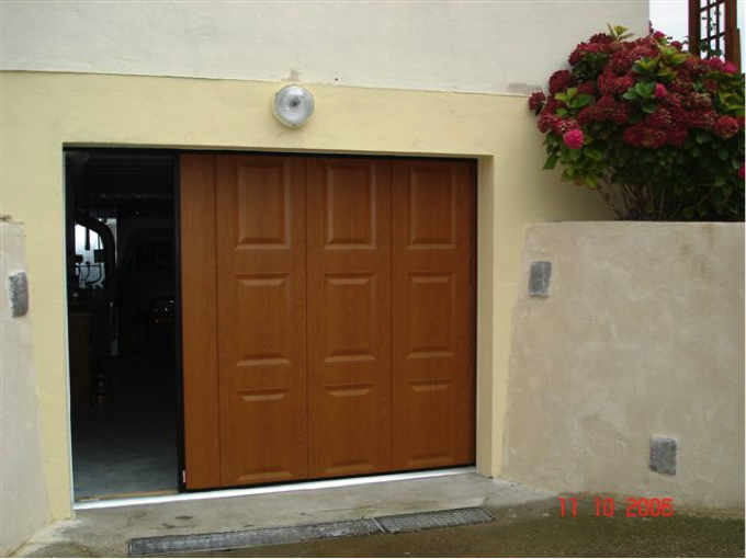 Installer une porte coulissante de garage
