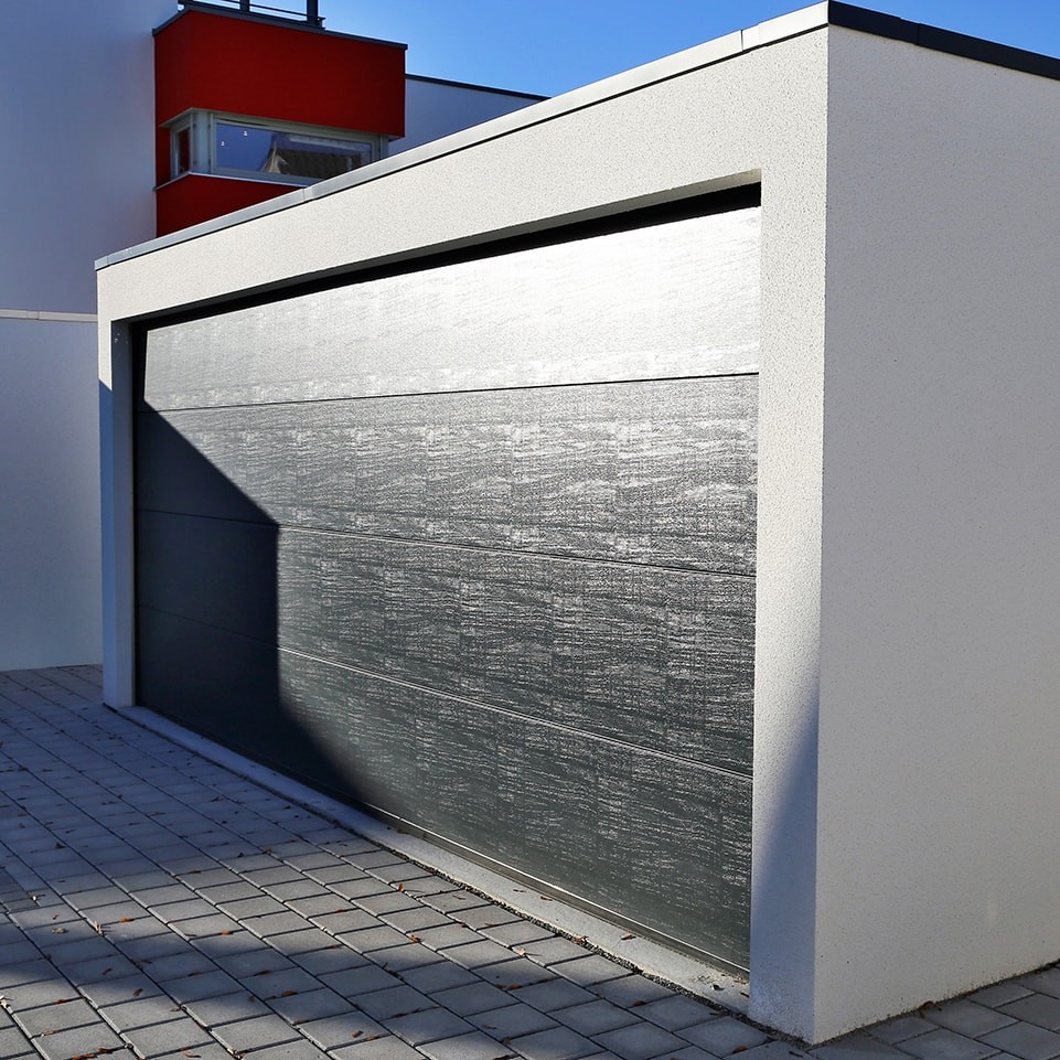 Porte de garage gain de place