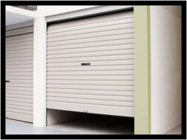 Porte de garage enroulable manuelle à tirage direct