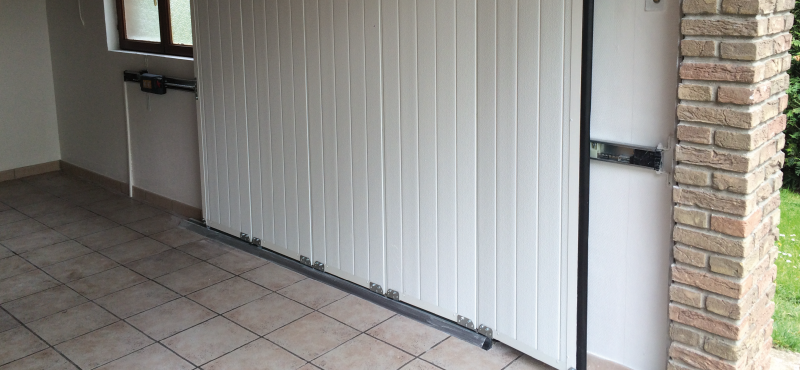 Porte de garage coulissante isolante prix