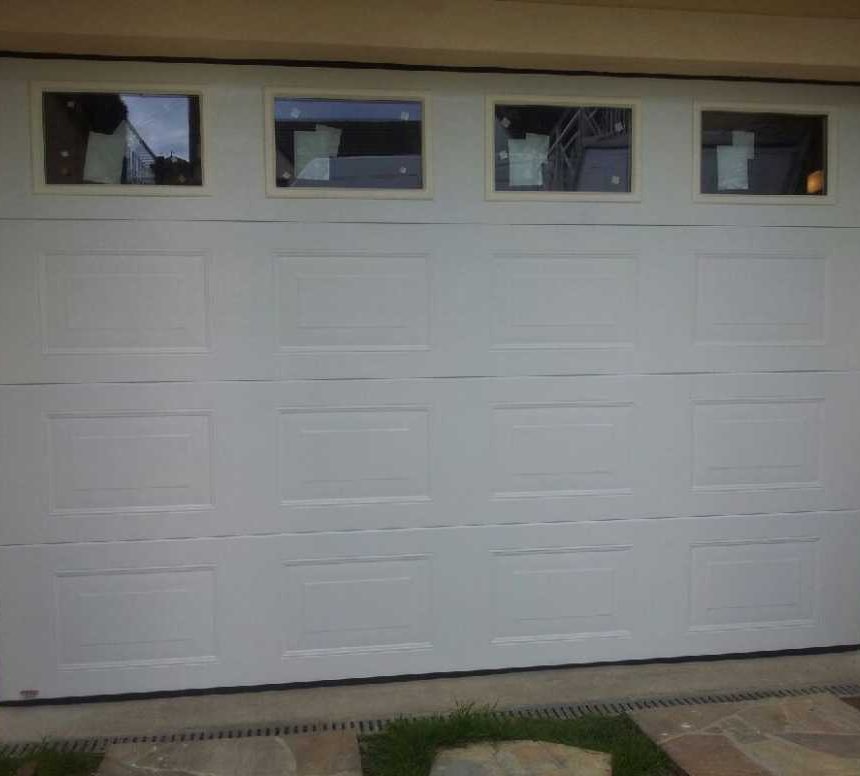Porte de garage avec vitrage
