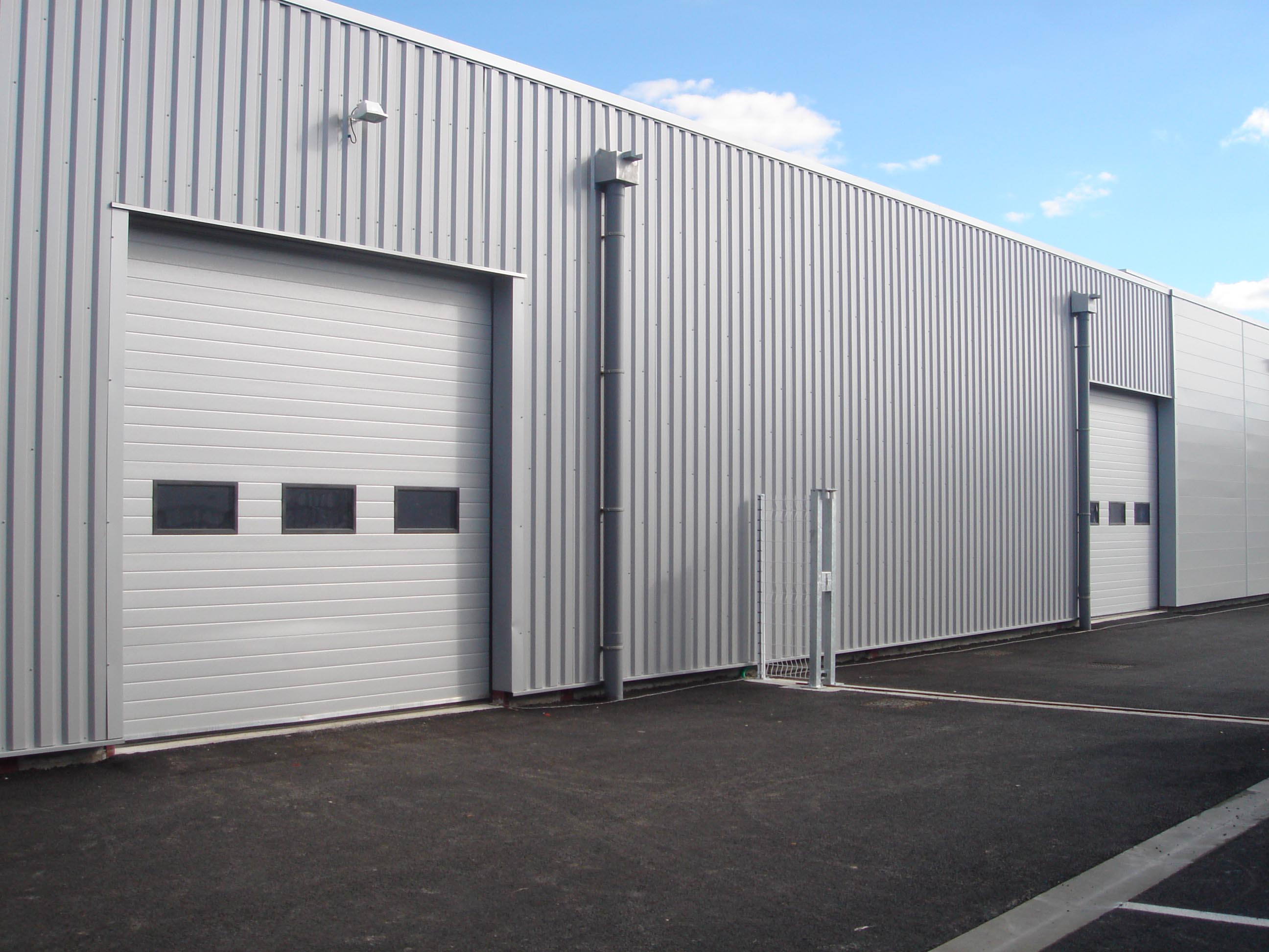 Porte de garage grand format