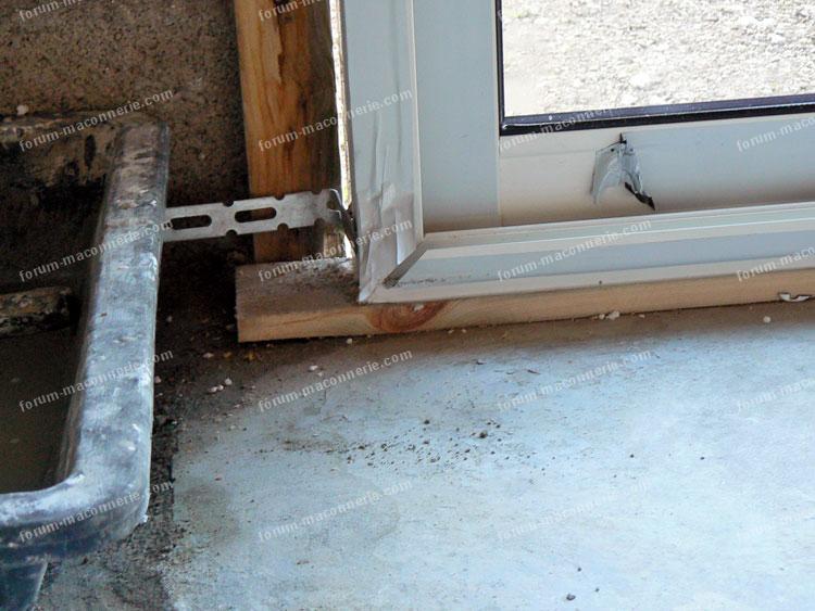 Comment fixer une porte de garage en bois