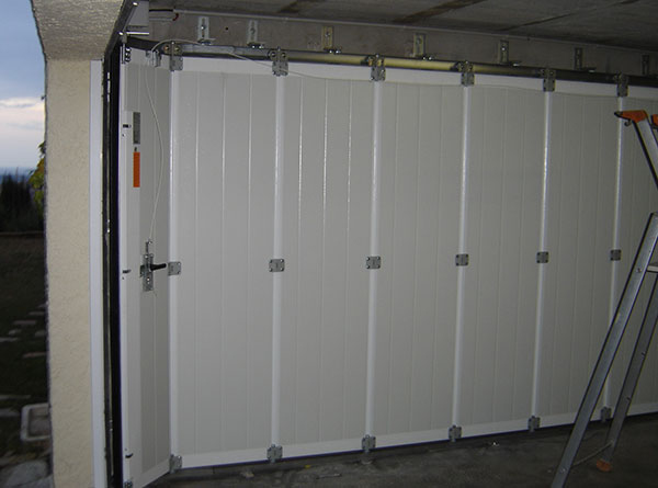 Installer porte de garage coulissante