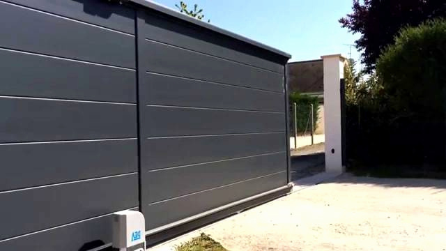 Prix porte de garage sectionnelle motorisée sur mesure