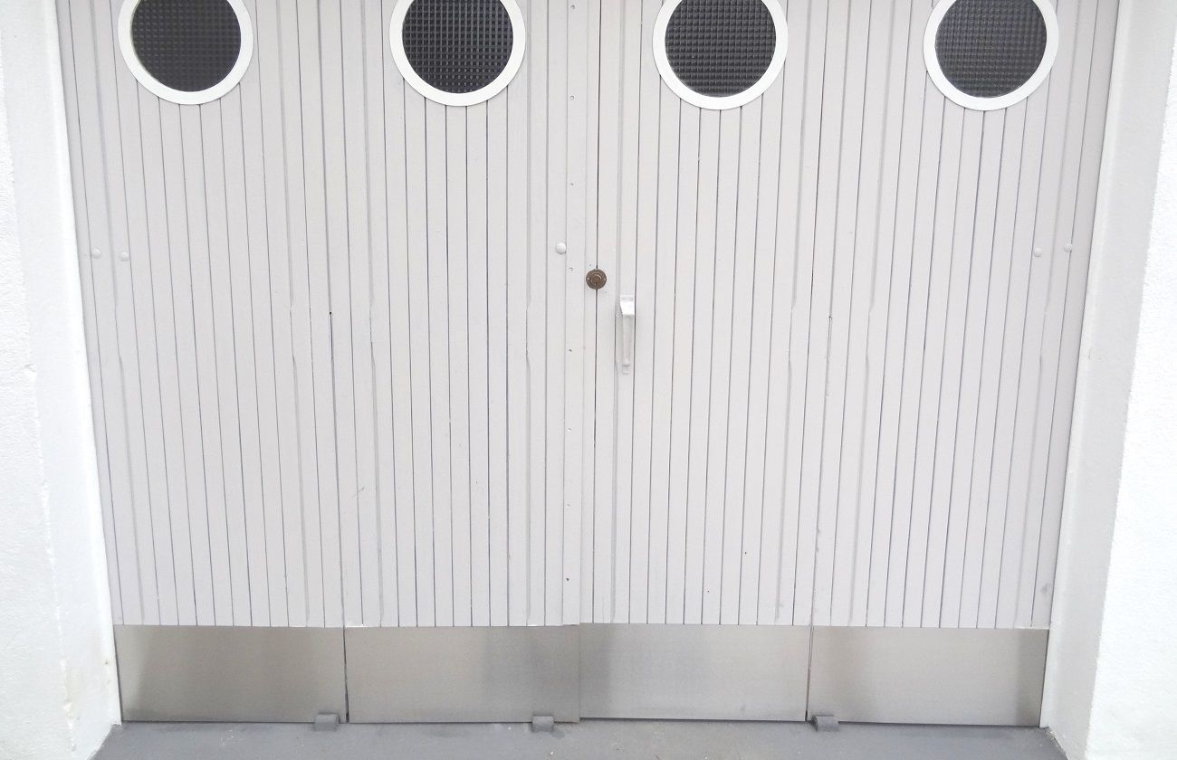 Protection bas de porte de garage