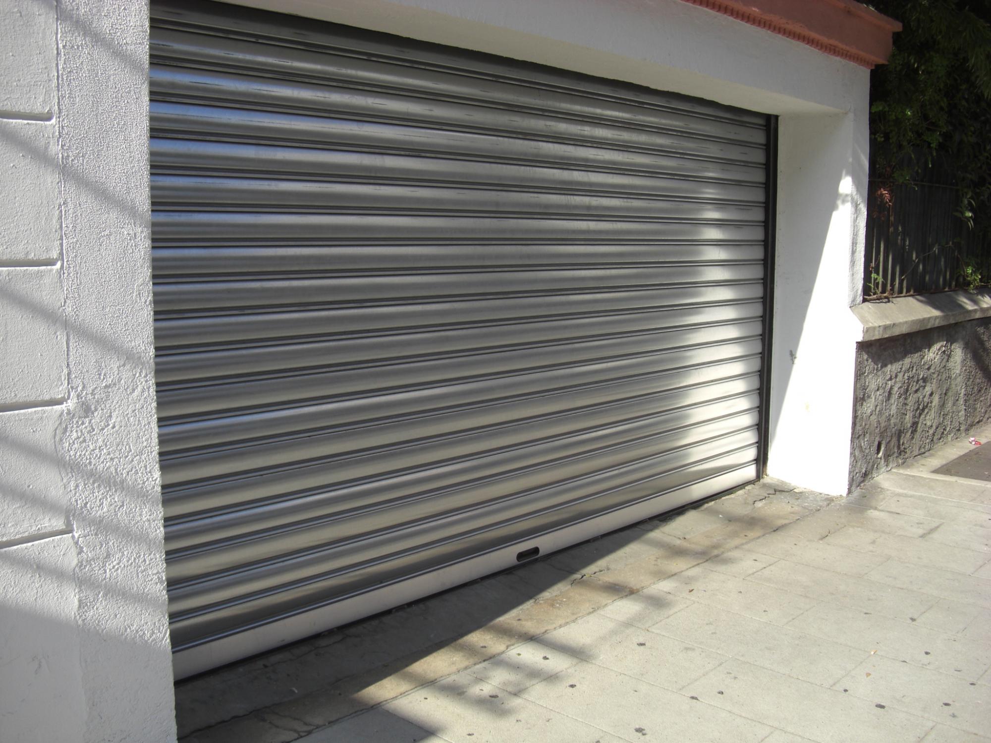 Porte de garage rideau métallique
